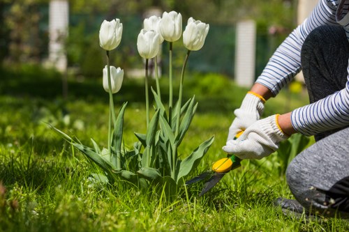 Garden maintenance services being performed